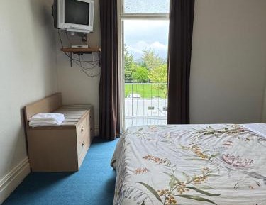 Economy Triple Room with Shared Bathroom