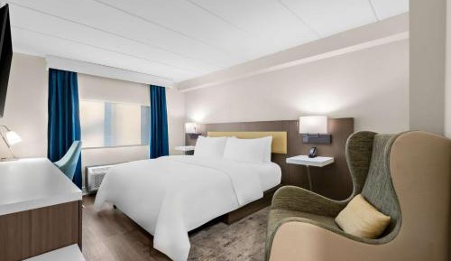 Two-Room King Suite with Sofa Bed and Walk-In Shower - Non-Smoking