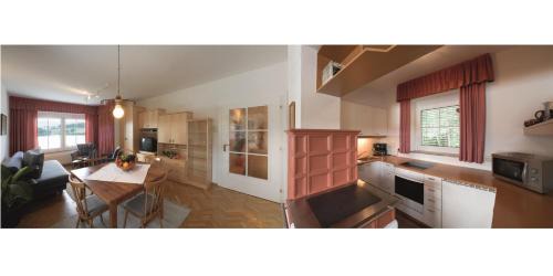 Three-Bedroom Apartment with Balcony and Lake View