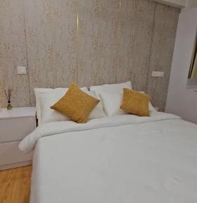 Three-Bedroom Apartment with Balcony