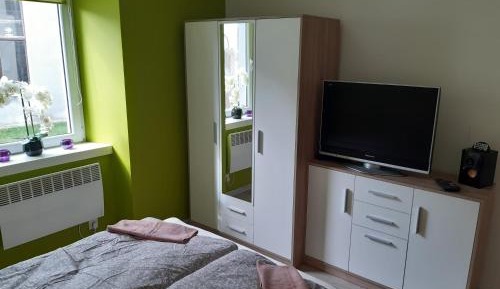 Deluxe One-Bedroom Apartment with Garden View