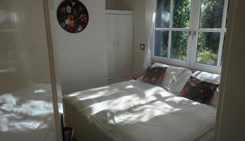 Deluxe One-Bedroom Apartment with Garden View