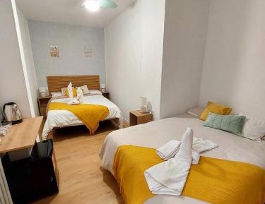 Quadruple Room with Shared Bathroom