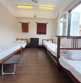 Single Bed in Female Dormitory Room