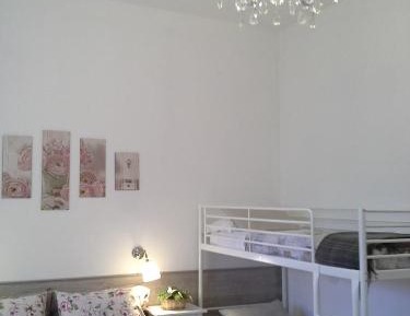Quadruple Room with Private Bathroom