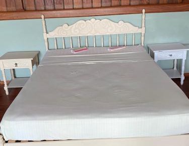 Single Bed in Dormitory Room