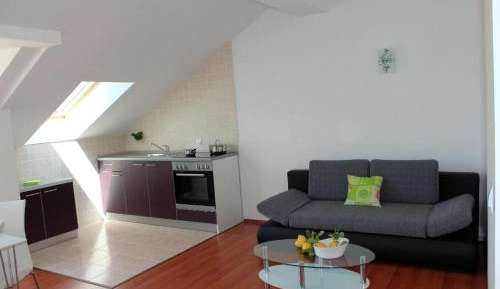 One-Bedroom Apartment with Balcony and Sea View
