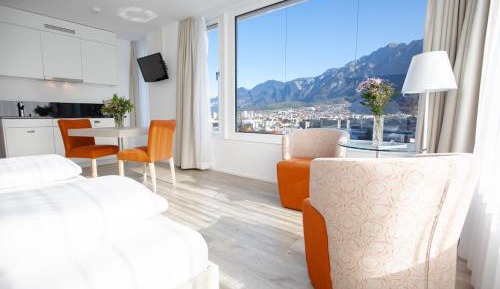 Deluxe Room with Two Zip Beds and Mountain View