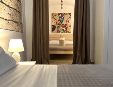 Quadruple Room with Private Bathroom