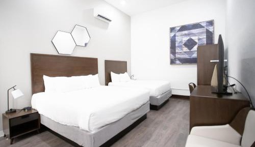 Deluxe Room with King and Queen Bed - Non-Smoking