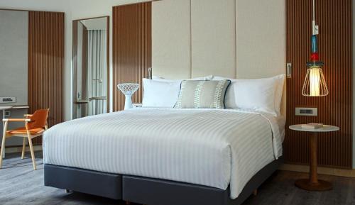 Club Room 1 King Bed with Balcony and Pool View, M Club Lounge Access