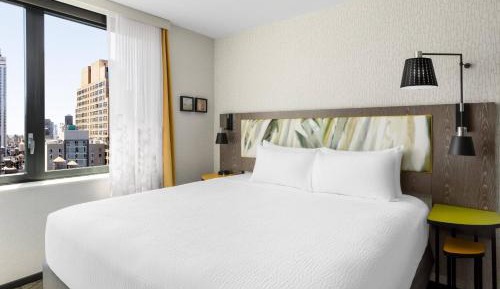 King Studio with Partial City View and Full Kitchenette - Mobility/Hearing Accessible w/Roll In Shower