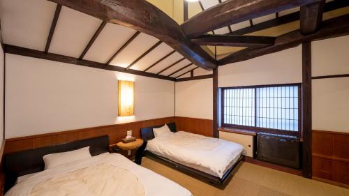 Traditional Japanese-Style Twin Room with Private Hot Spring Bath【Fukujuso】
