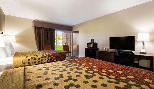 Efficiency Quadruple Room with Two Queen Beds and Balcony - Non Smoking/Upper floor/Interior Hall