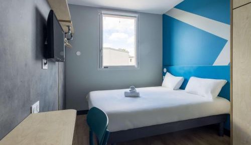 Room with One Queen Bed and One Bunk Bed