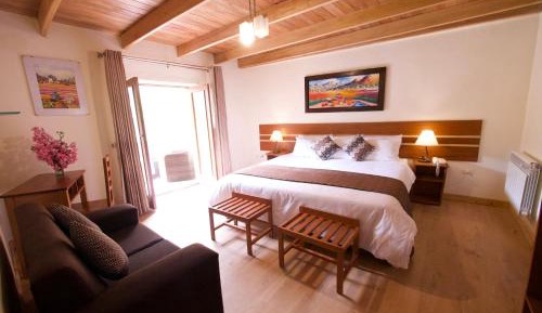 Deluxe King Room with Balcony and View