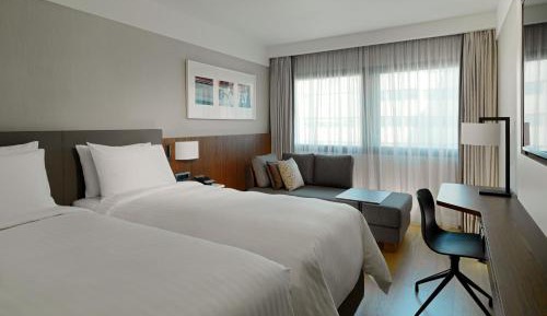 Premium Guest Room with Two Single Beds and City View
