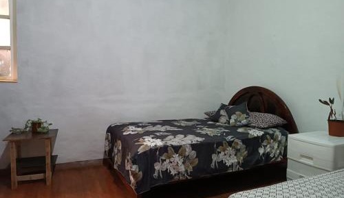 Single Bed in Dormitory Room