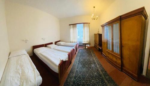 Quadruple Room with Shared Bathroom