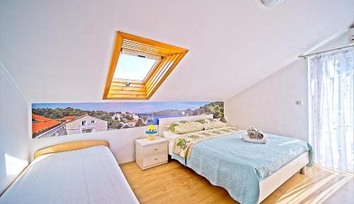One-Bedroom Apartment with Balcony and Park View