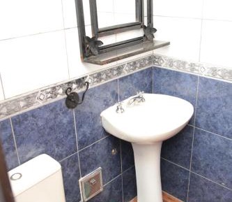 Quadruple Room with Private Bathroom