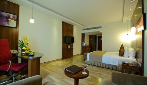 Deluxe Double Room with One way Airport Drop, Two piece Laundry Non Cumulative