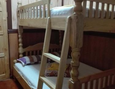Single Bed in Dormitory Room