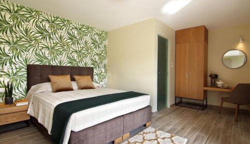 King Suite with Balcony & Side Sea View