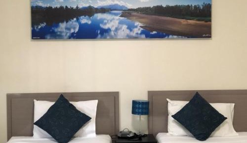 Queen Bed and  King single Bedroom