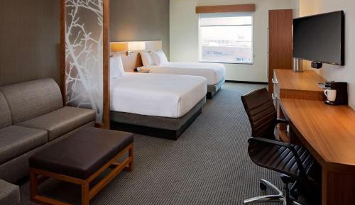 Queen Room with Two Queen Beds and Sofa Bed
