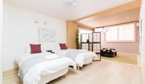 Quadruple Room with Private Bathroom