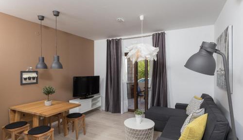 One-Bedroom Apartment with Terrace and Garden View