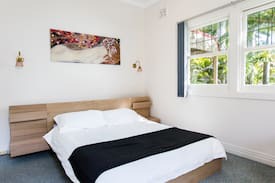 Korora Villa | Stunning Jacaranda villa. Sleeps 14