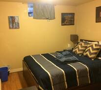 North Park Hill House | NE Park Hill room w queen bed, shared living rooms