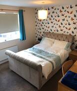 Brixworth House | Butterfly room. Modern village home.