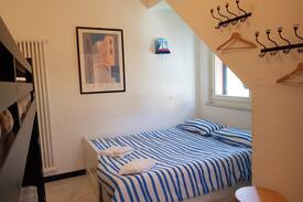 Solaro Apartment | Attic Sole + Room Luna