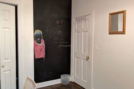 Bedford-Stuyvesant Apartment | Beautiful room with a brick wall