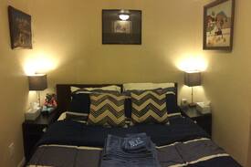 North Park Hill House | NE Park Hill room w queen bed, shared living rooms