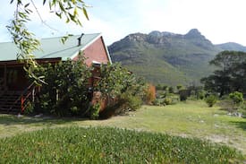 Slanghoek Cabin | Bains Kloof Cabin on the banks of the river