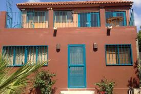 Cerritos House | Bottom floor of two story house.
