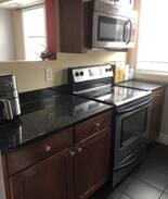 Garfield Heights Apartment | Quaint condo- plenty of natural sunlight