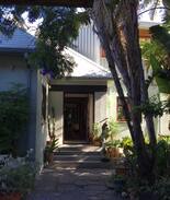 Kenilworth House | Home set in leafy garden with pool