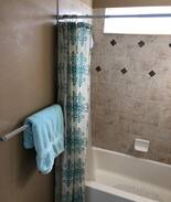 Vista Ridge House | Mountain Views! Bedroom with private bathroom.