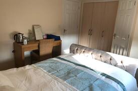 Brixworth House | Butterfly room. Modern village home.