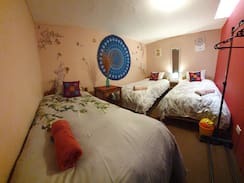 Cusco Historic Center House | Habitación triplex en KARMAWASI