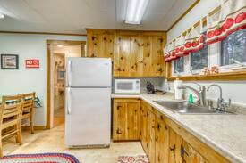 Southport Cabin | Cozy, dog-friendly cabin w/ a wood burning fireplace & a full kitchen