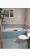 Bur Dubai Apartment | Master bedroom with attached bath bathtub 2500 aed