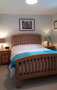 Llangynog House | Dolau Cottage - cosy double bedroom with ensuite