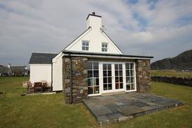 Slate Islands House | 65 Easdale Island, with stunning sea views.