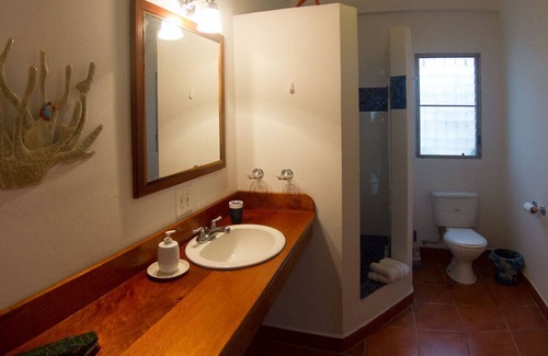 Forest Home Apartment | Our Sea Garden Suite faces the Caribbean and awaits you
